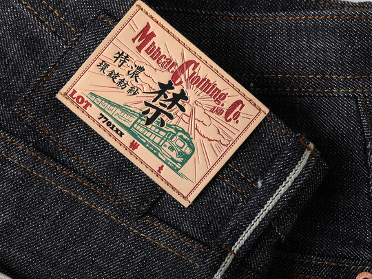 16OZ "UNAUTHORIZED" 705 Wide-Leg jeans