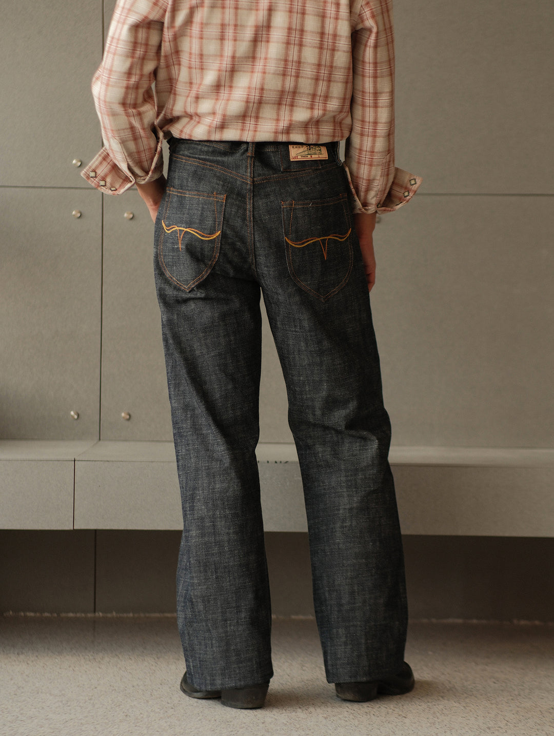 16OZ "UNAUTHORIZED" 705 Wide-Leg jeans